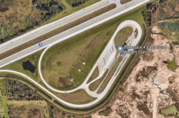 Aerial view of a highway trucker convenience area at a weigh station near Tampa.