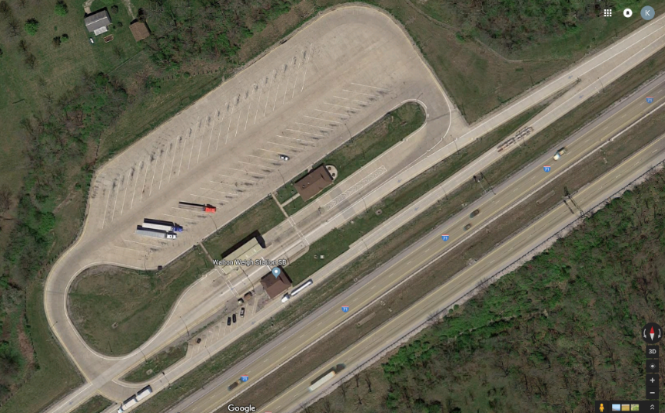 Aerial view of a highway truck parking facility at Boone Country weigh station on Interstate 71 southbound.