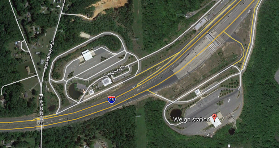 Aerial view of highway truck parking facilities at Perryville, Maryland weigh station just off of the Interstate.