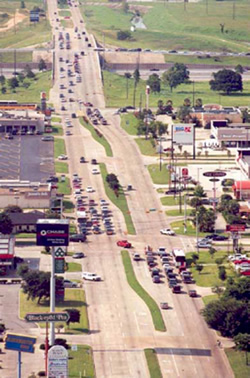 Major arterial street with median and left turn bays.