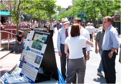 figure 52 - photo - Photograph of people gathering at a public outreach event for managed lanes in Denver, CO