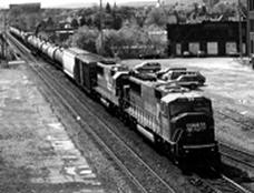 Picture of freight train on rail tracks.