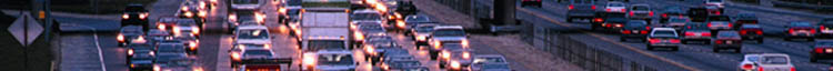 time lapse of traffic traveling down and exiting from a freeway at night