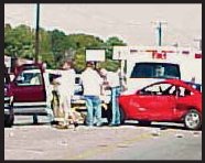 Photograph of vehicles that crashed when one tried to make a left turn across traffic. 