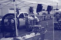 Photo. A water-delivery service preparing resources for disaster response.