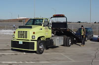 A tow truck and the operator.