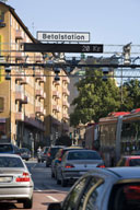 Photo of roadways with toll gantries, representing entrance/exit points in an area with cordon-pricing.