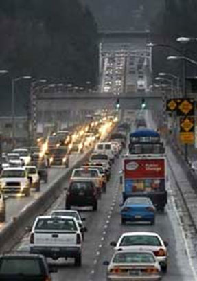 Photo of existing SR 520 bridge, with congestion.