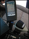 Photo showing the technology associated with the MnPASS I-394 HOT lanes.  The in-vehicle display indicating the tag status of any vehicle passing the patrol vehicle.