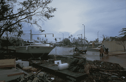 Picture of debris on a road following a storm.