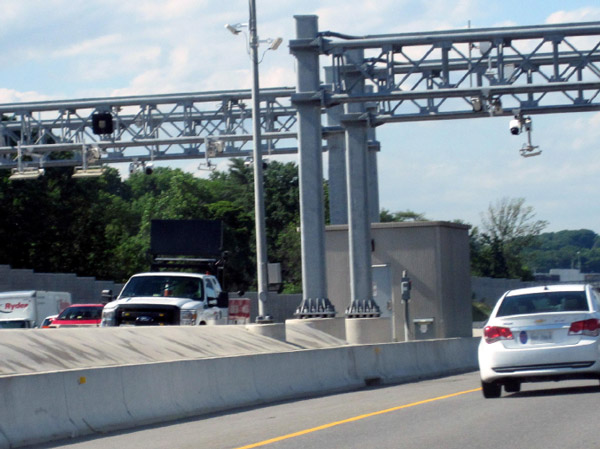 Photo shows a service vehicle positioned off the highway and ready to provide quick response if an incident occurs.