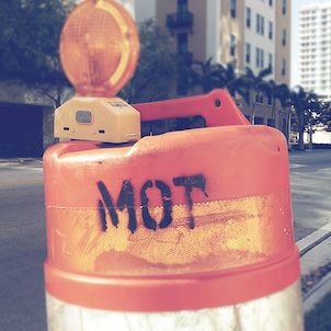 [photo 2]. This photo shows a roadway construction work zone pylon.