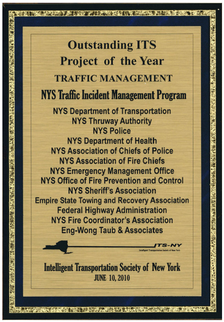 A photo of a plaque for 2010 Outstanding ITS Project of the Year award for the NYSDOT TIM Program.