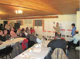 A group of staff attend a planning meeting.