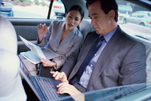 a woman and a man sharing a ride to work