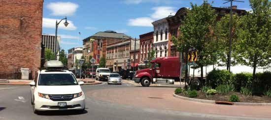 photo of traffic in a rotary in downtown Glen Falls, NY