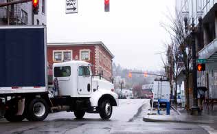 photo of a tractor-trailer on a city street