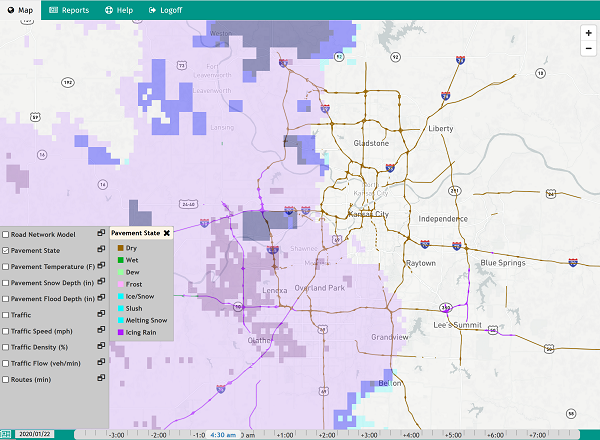 Image shows Kansas City and surrounding area. To the west of Kansas City is shaded in varying levels of purple, indicating the pavement state is icing rain.