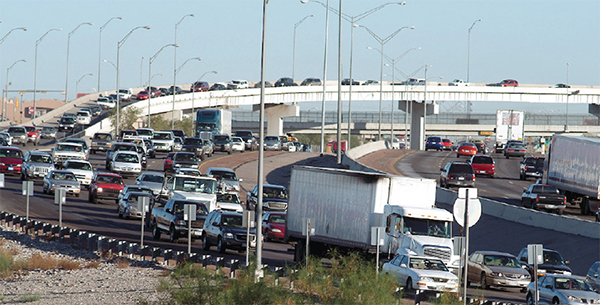 Traffic backing up on a highway on-ramp.