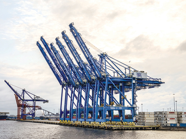 Port of Wilmington container cranes waiting to load and unload container ships.