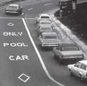 Photograph - Metered two-lane slip ramp.  The right lane is metered and the left lane is designated as an HOV lane.  The words CAR POOL ONLY have been marked on the HOV lane.