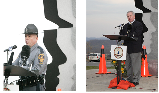 Speakers standing in front of the VDOT Workers Memorial Wall.