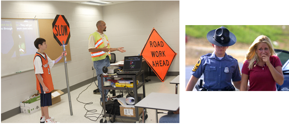 A VDOT staffer speaking to a classroom of students while a student holds a 'SLOW' paddle.