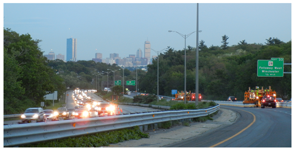 Heavy traffic in leftbound lanes; right lanes have minimal traffic in work zone.