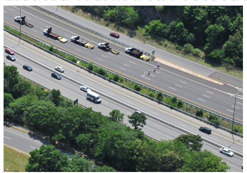 Aerial photo of four closed lanes leading to the work zone area.