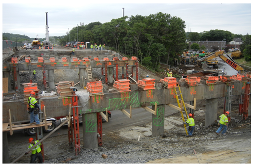 Post-demolition photo shows only the support pylons remaining after the bridge decking was removed the night before.