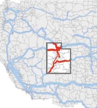 Map of the roadways across the Western United States with the major freight corridors highlighted in blue. The state of Utah is outlined and its freight corridors are highlighted in red.