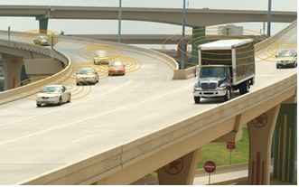 Modified photo shows merging vehicles overlaid with concentric circles indicating vehicle-to-vehicle and vehicle-to-infrastructure communications.