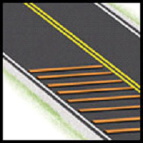 photo of rumble strips across a lane